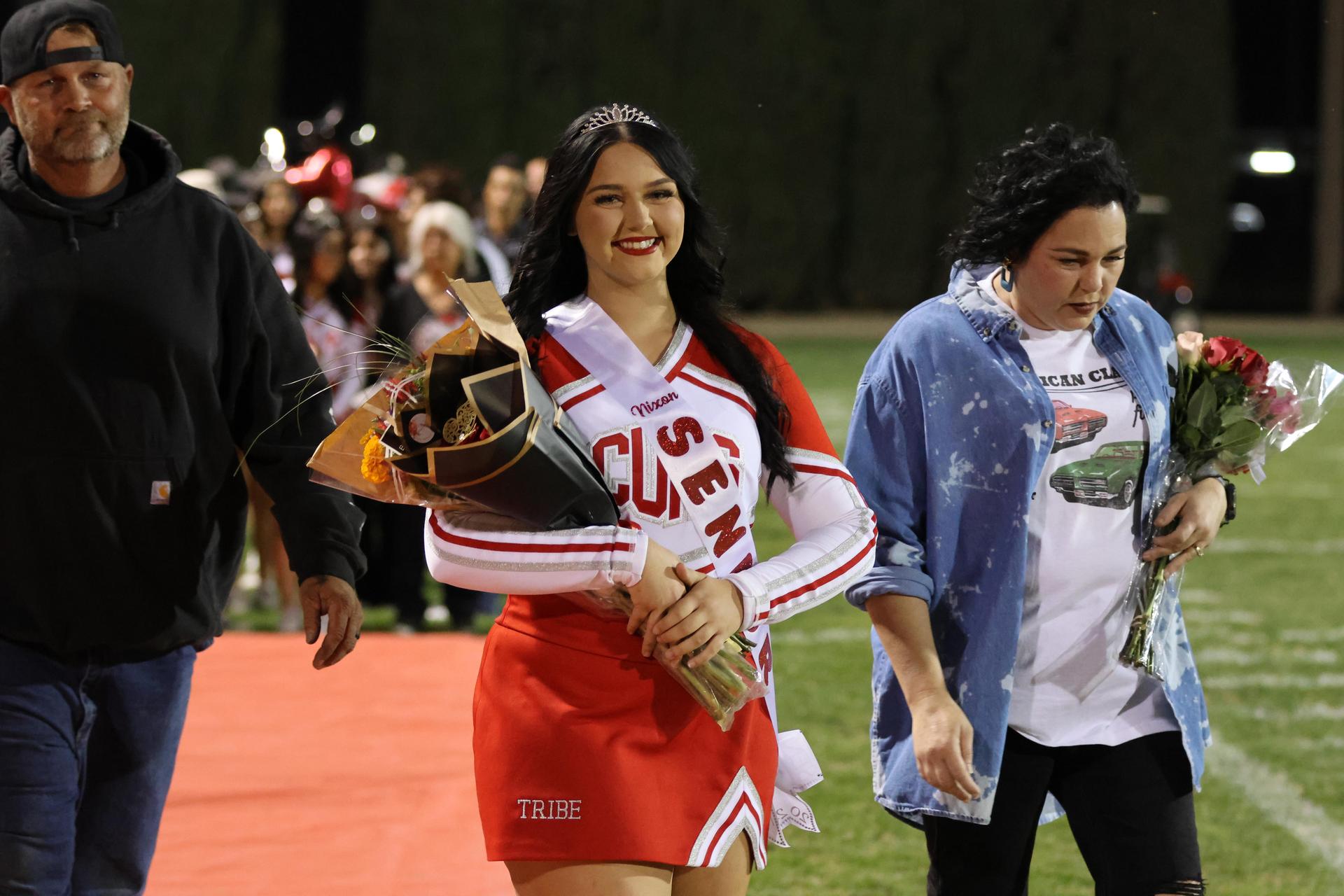 seniors and their escorts celebrating senior night