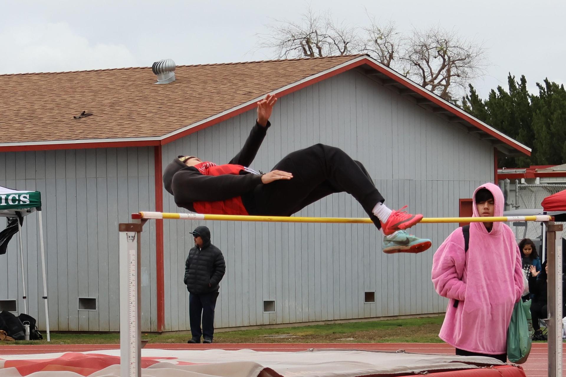 varsity boys high jumping