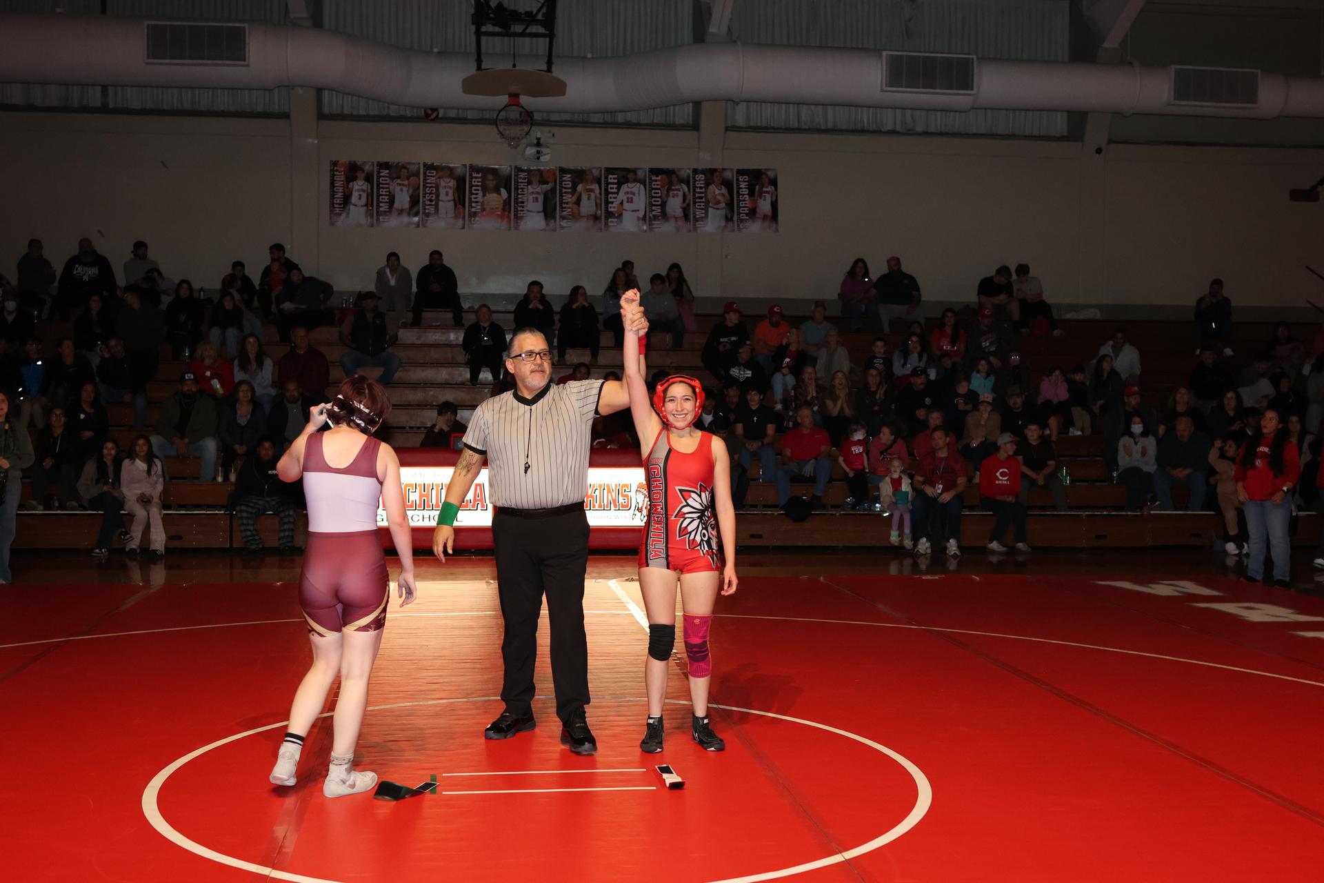 Wrestling winners with hands up 9