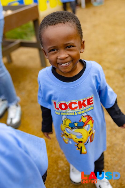 Child Smiling and enjoying the outdoor space