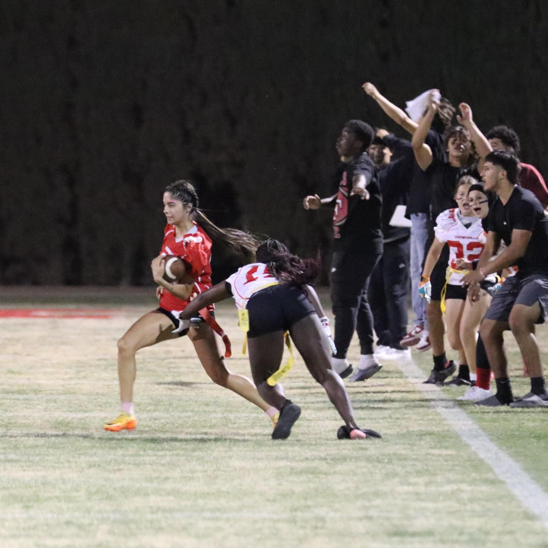girls playing flag football