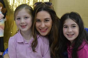 A family poses together.