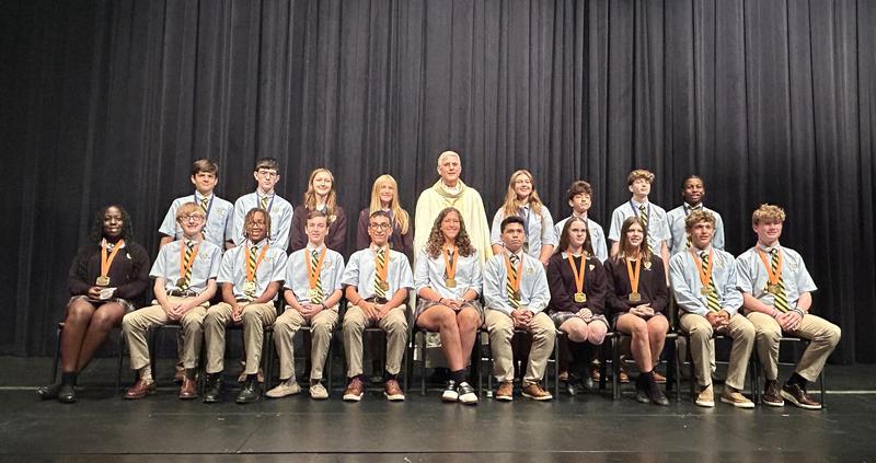 Group photo of St. Joe students honored for high scores on the PreACT