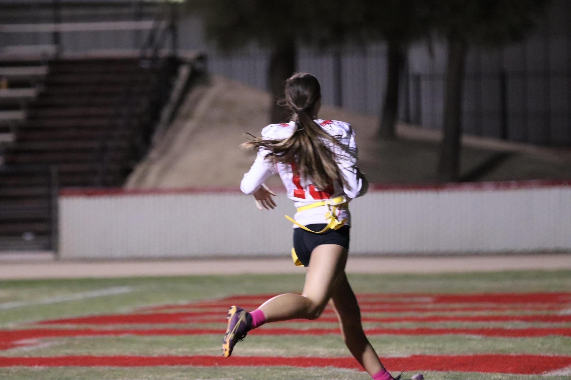 girls playing flag football