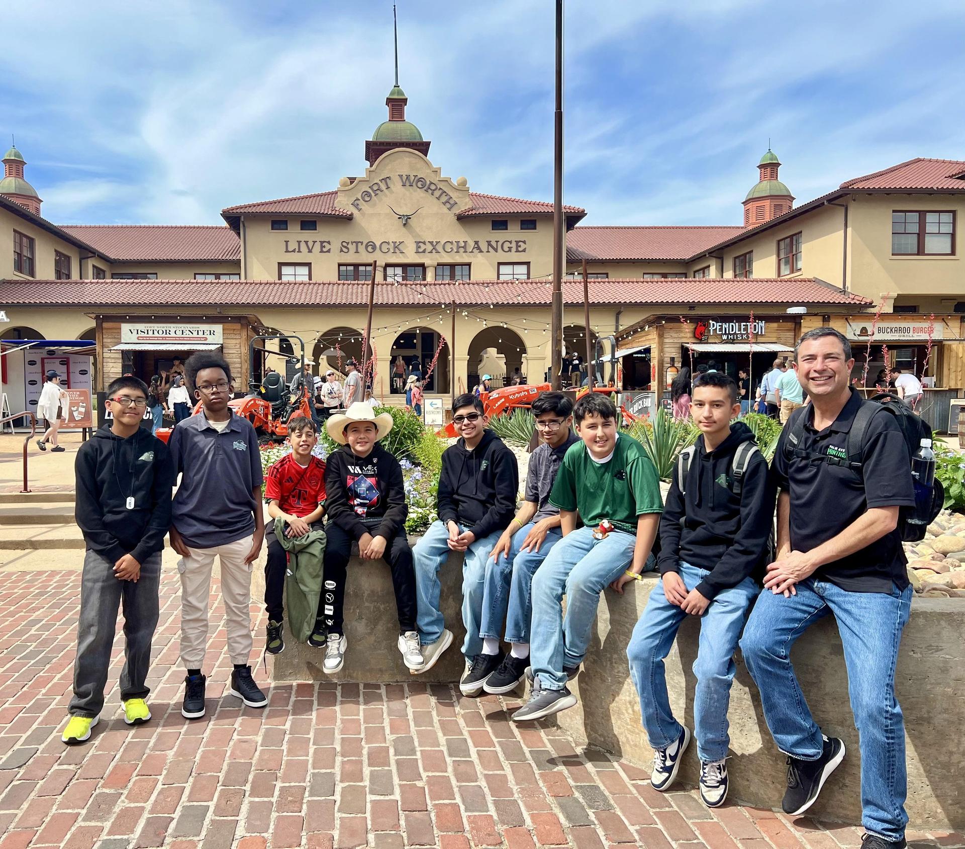 Mr. Morosa and the robotics team in Texas 