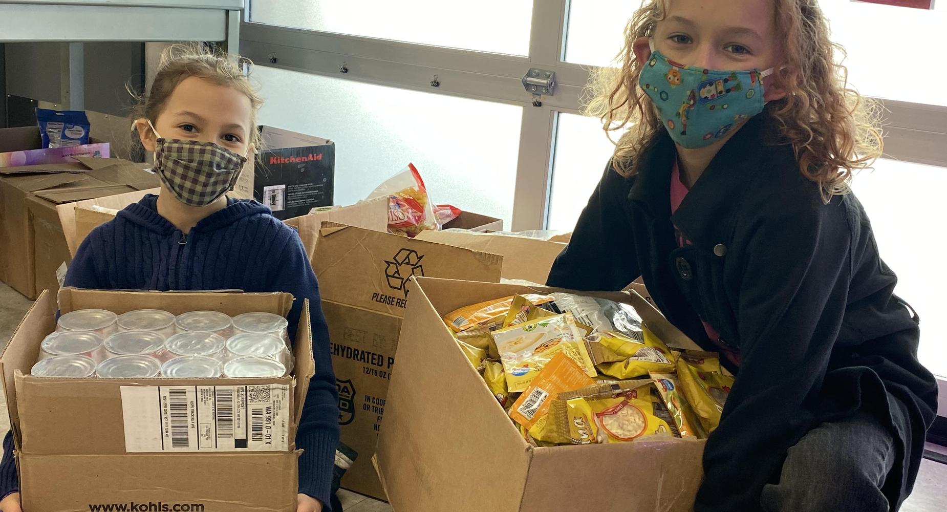 The Cannon siblings helping for the food drive!