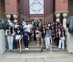 Image of students standing outside the Palmer Museum of Art