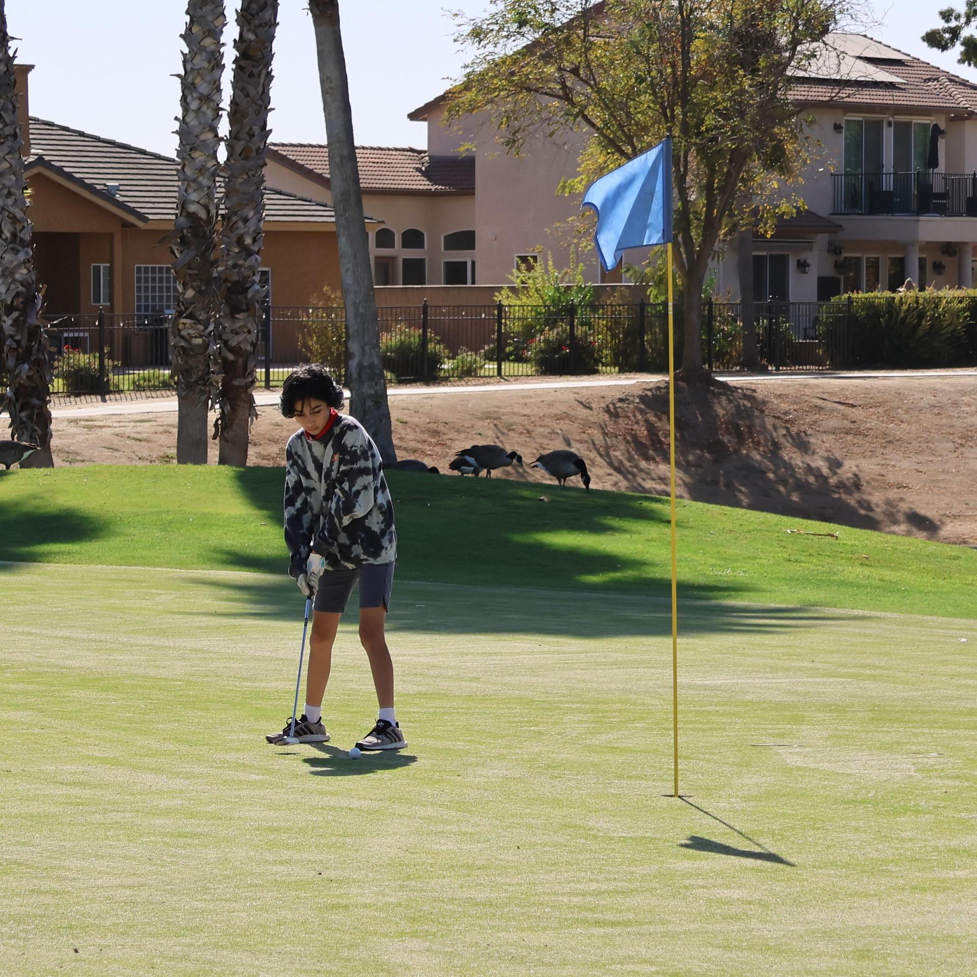 Girls golfers in action at the championships