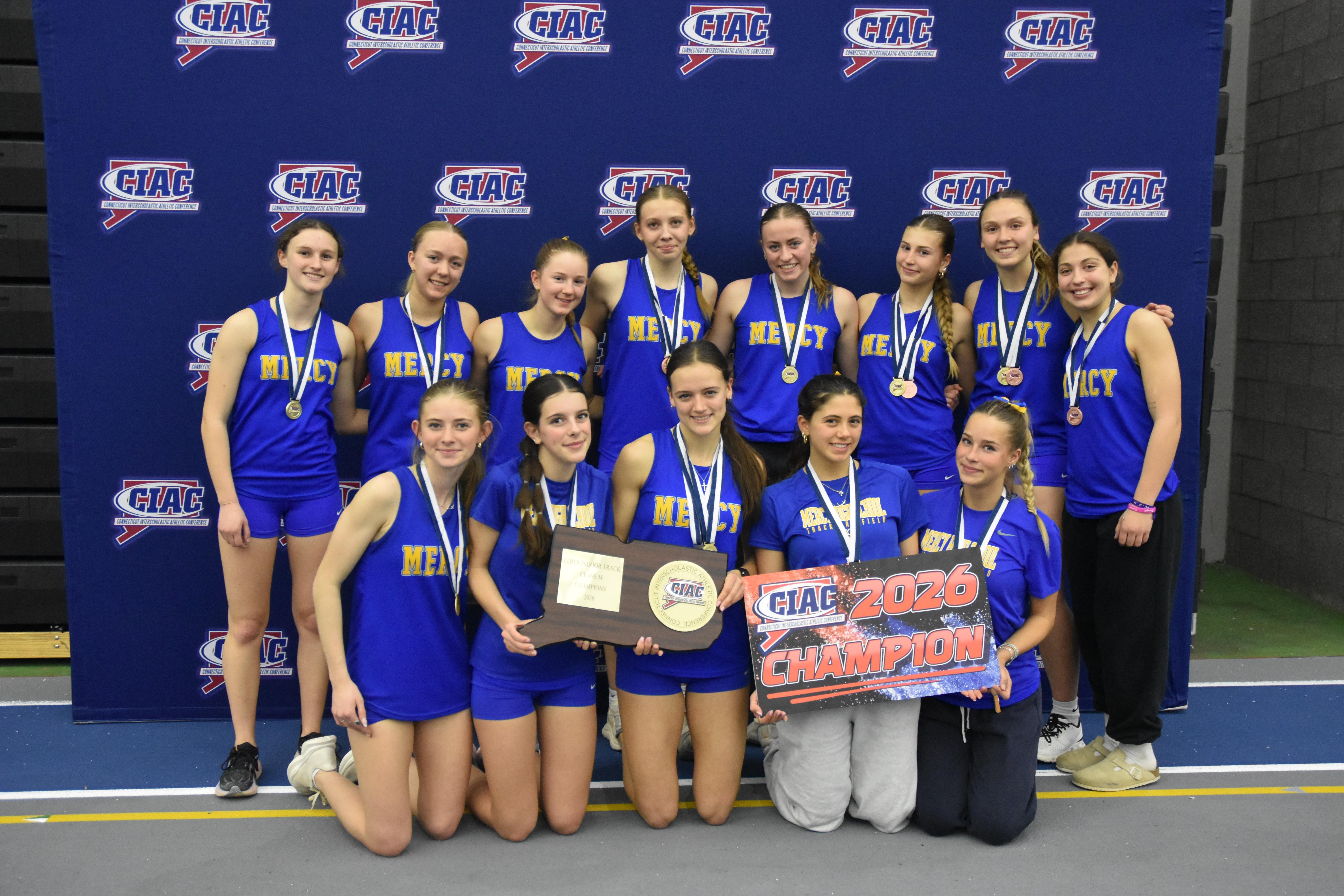 Mercy Track and Field Team winning indoor title