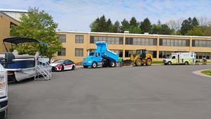 Vehicles are lined up outside Penn Yan Elementary School.