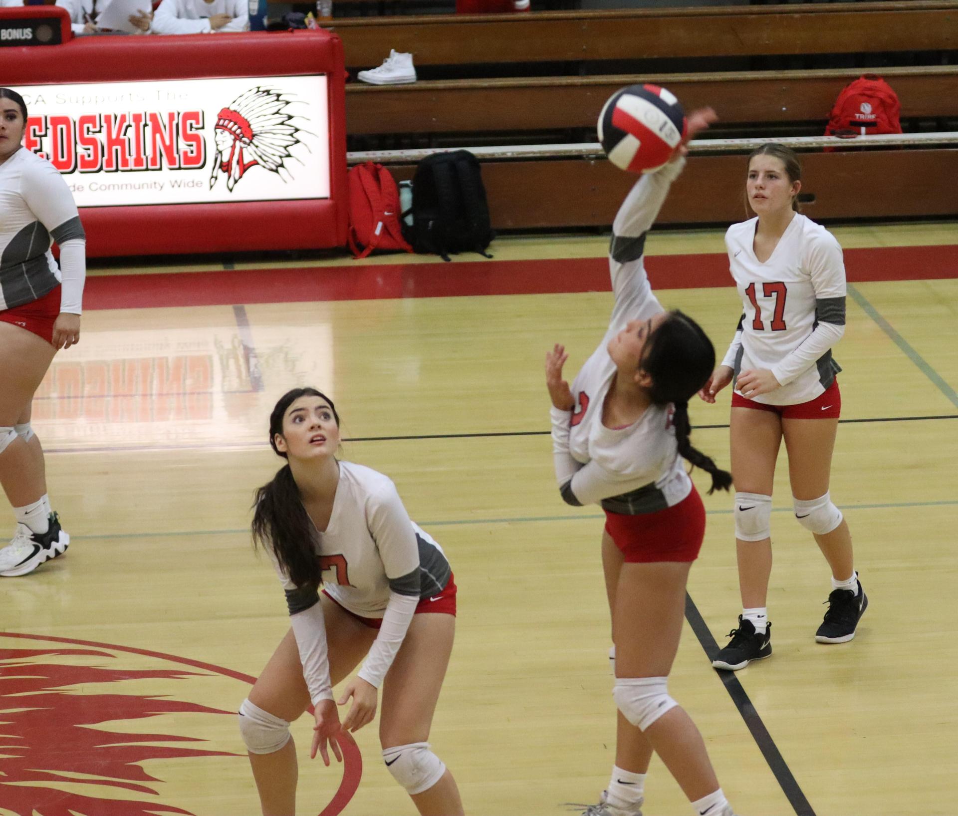 junior varsity girls playing volleyball against Mendota