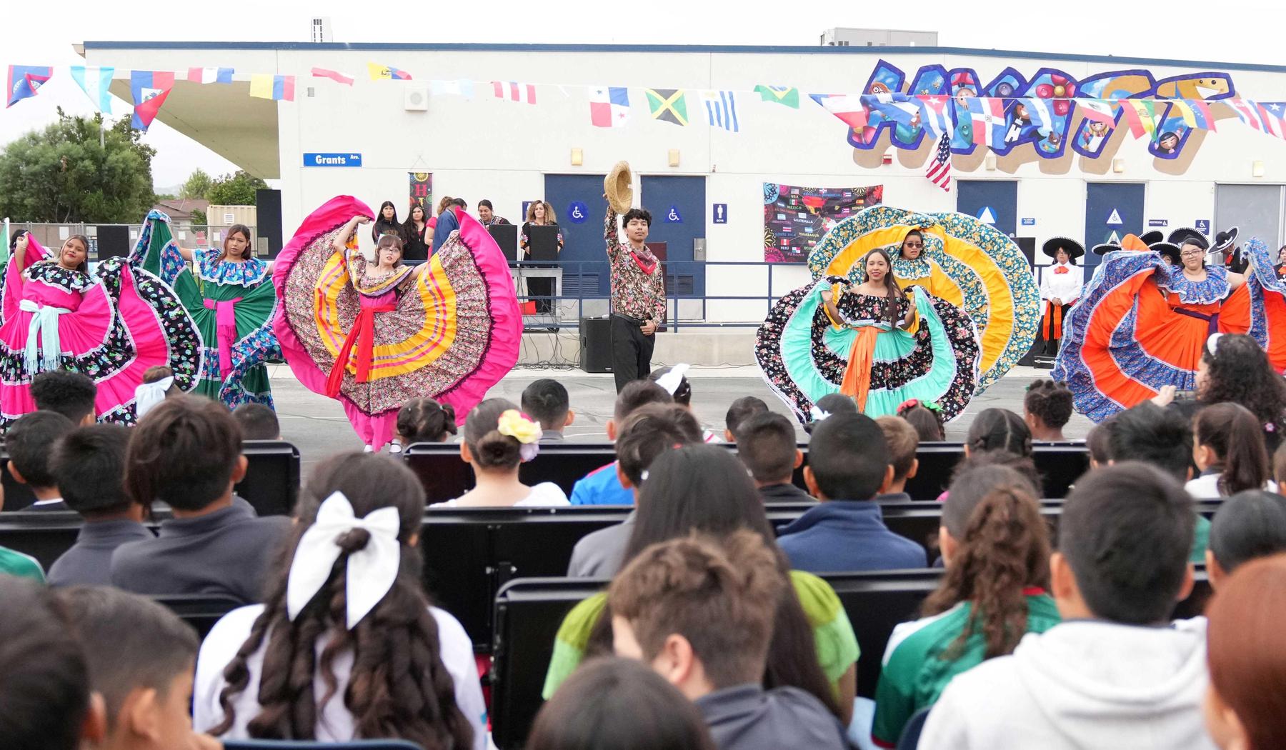 SJHS Folklorico Dancers performing outside at Hyatt WLA