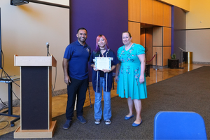 NPHS 2026 Athletics Banquet, senior receives certificate