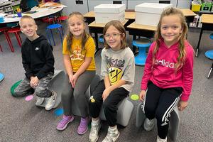 Second-graders Bradley Whitney, Mia Minor, Gwyn Martin, and Amity Koontz try out the new flexible seating