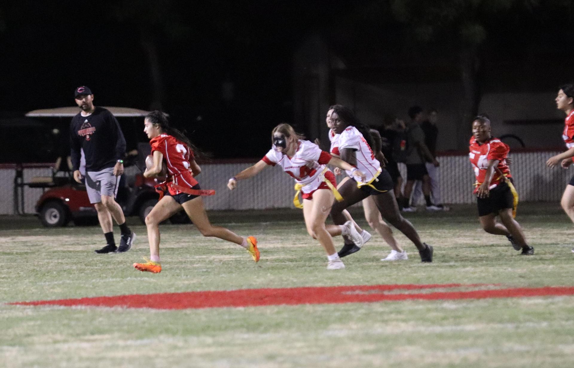 girls playing flag football