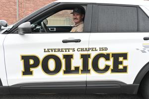 Mr. Guthrie sitting in the car.