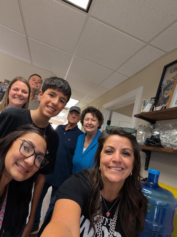 Selfie with Llanas, Sanchez, and student council as they pack donation boxes.