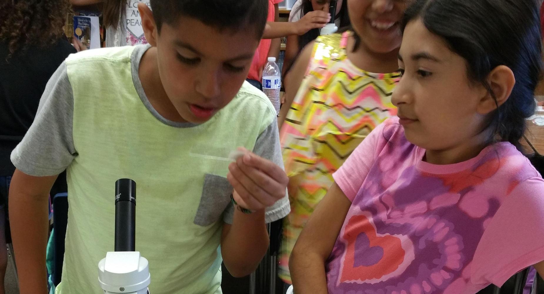 Students doing a science experiment.