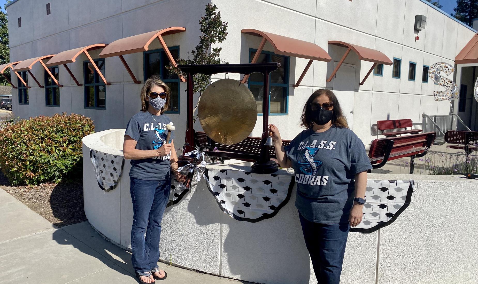 C.L.A.S.S. staff ringing the bell.