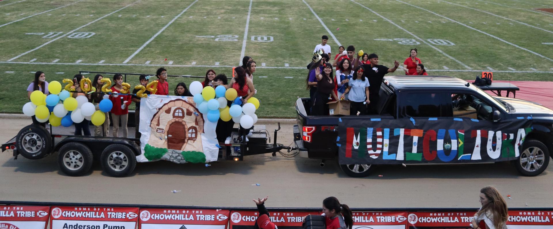 floats on the track between football games