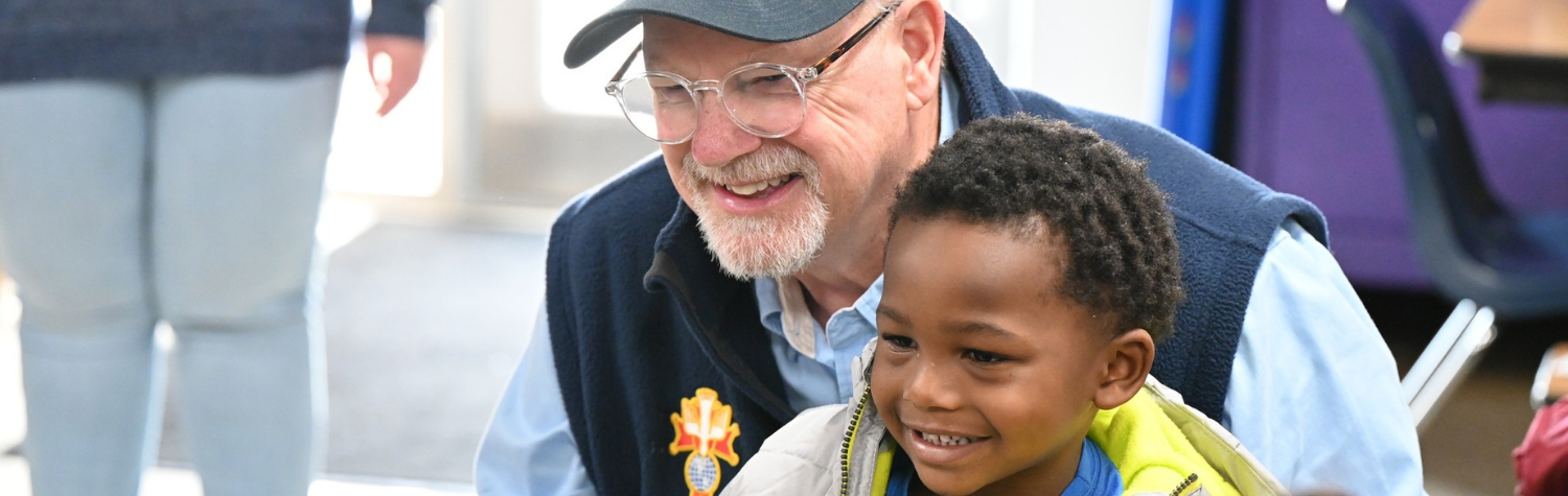 volunteer with a student