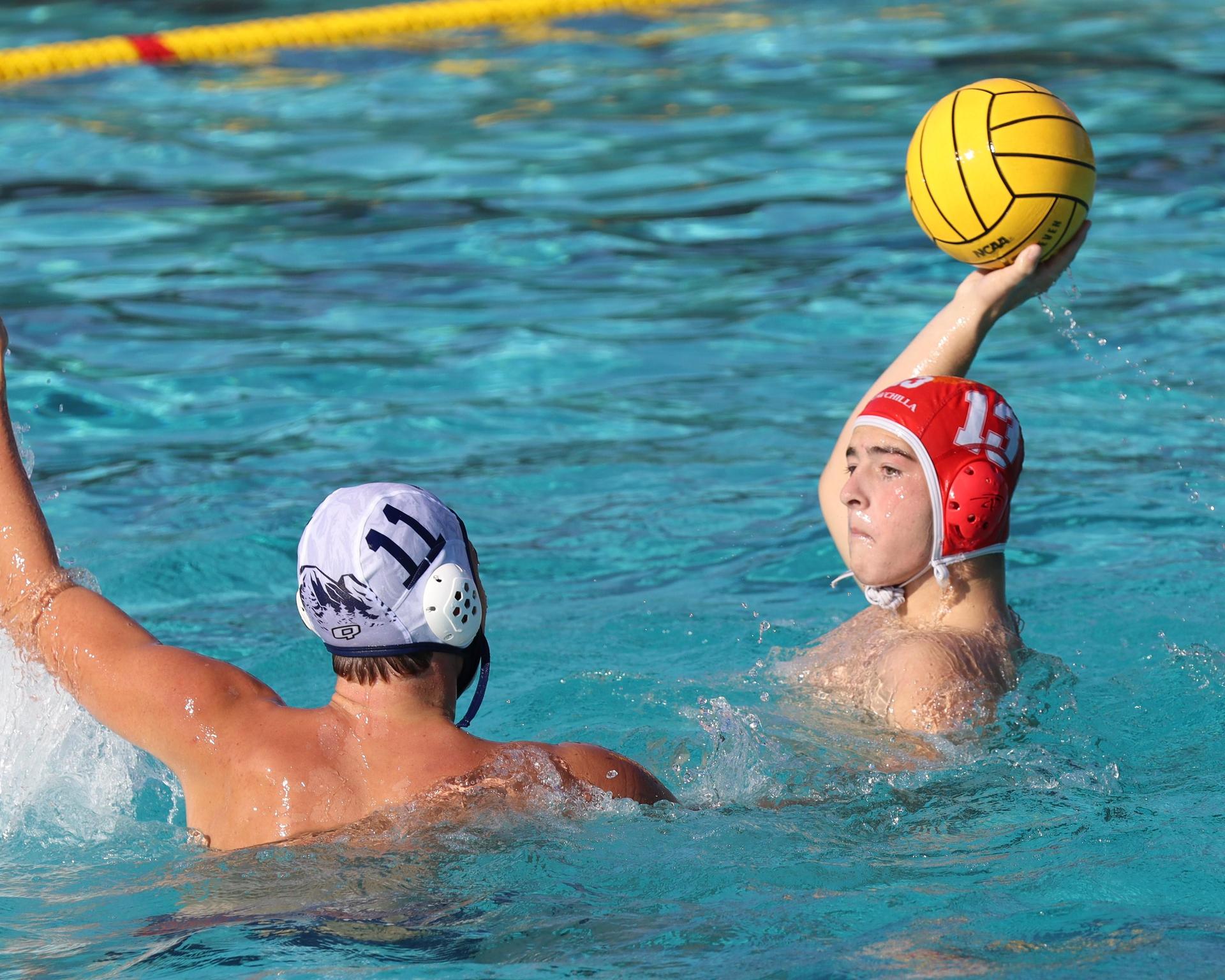 Boys playing water polo against Yosemite