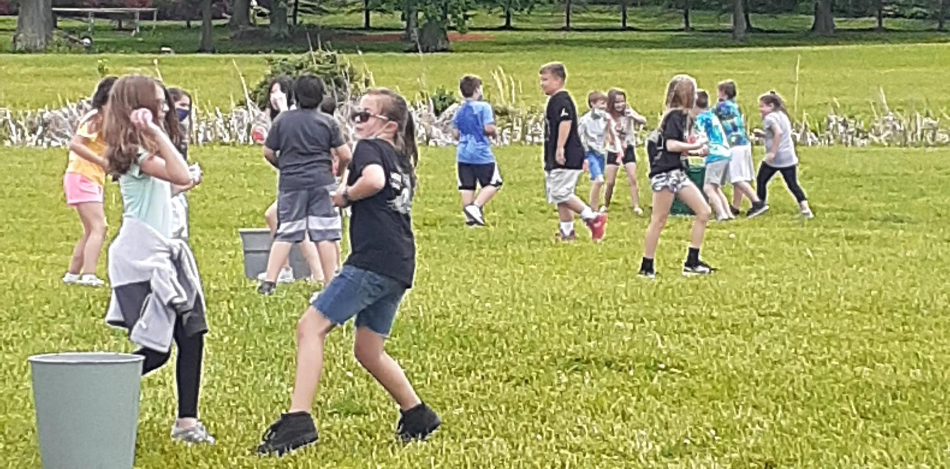 kids having a water balloon fight