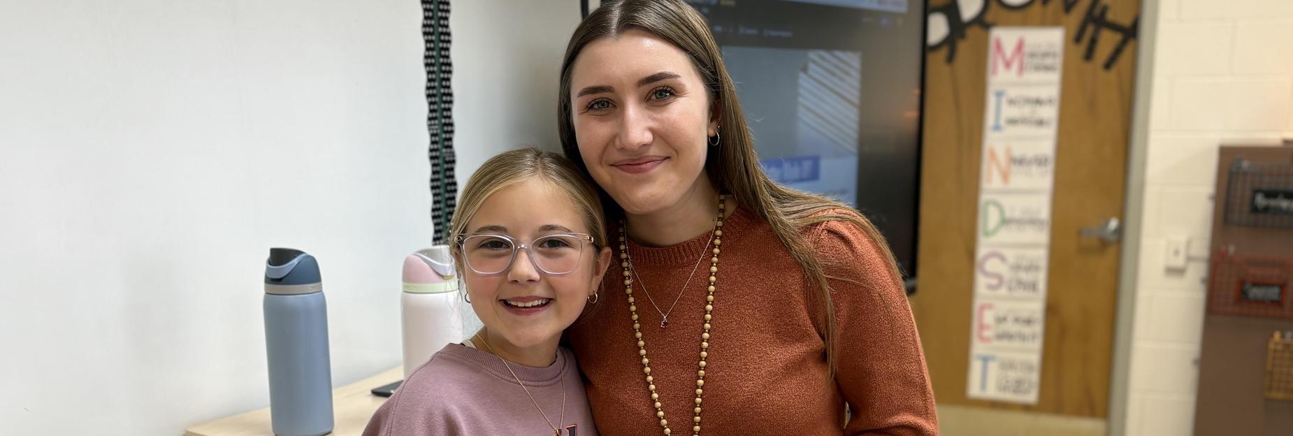 Student and teacher in class