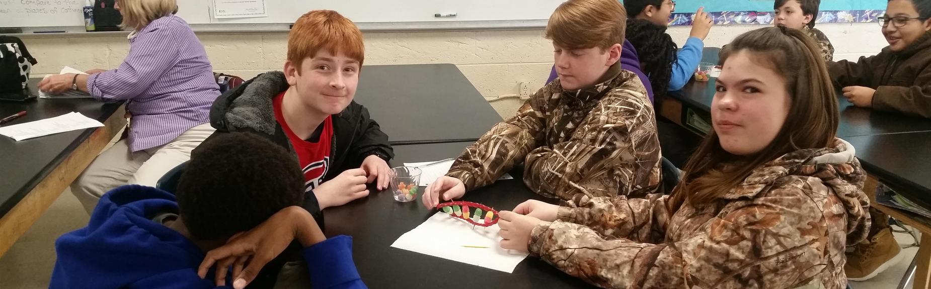 students collaborating in small group