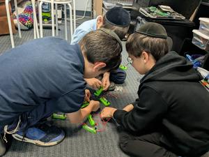 Third grade boys working with snap-circuits.
