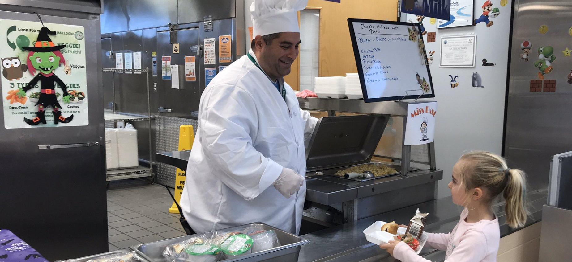 Principal serving lunch