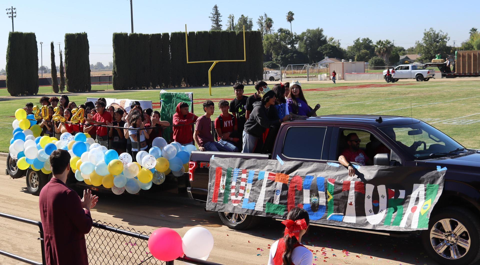 students and staff at the homecoming rally