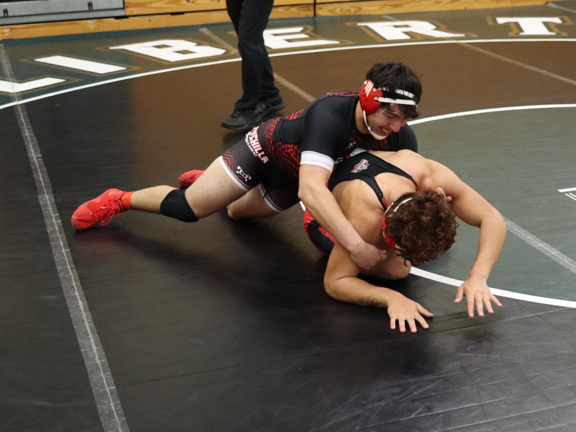 wrestlers in action at the Hawks invitational