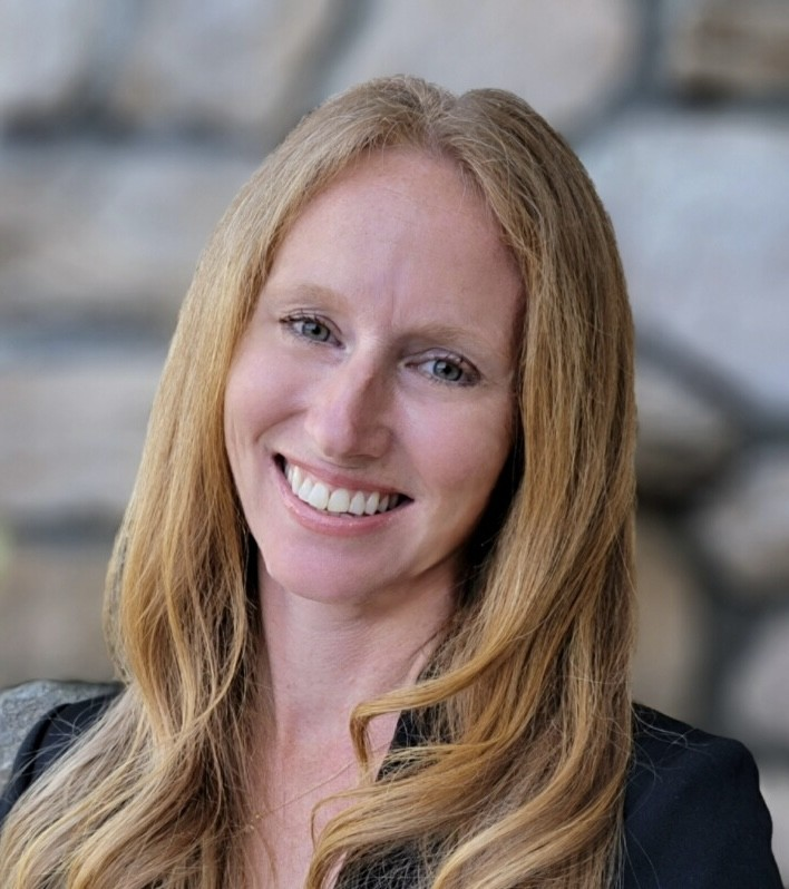 Sarah Silva, a woman with long blond hair smiling