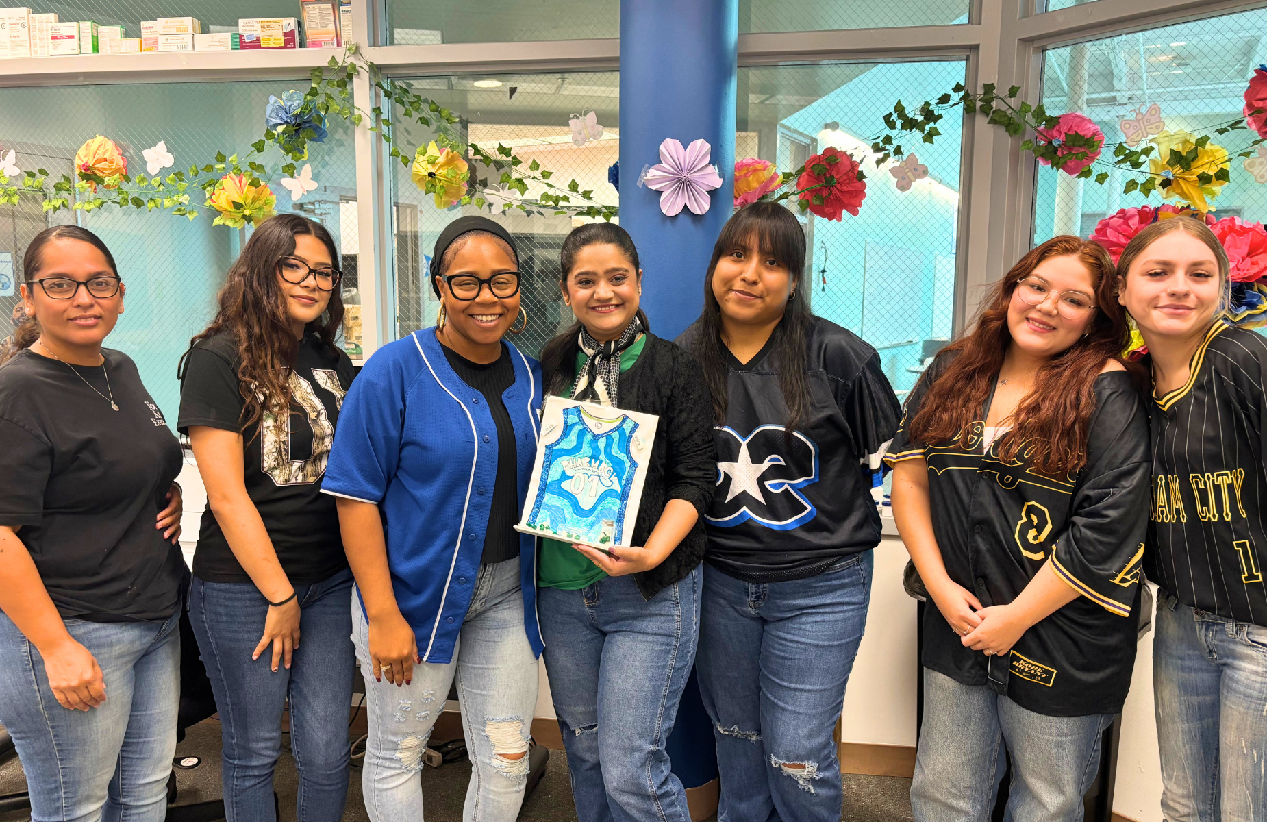 September Spirit at Adult & Career Education- ACE team photos of staff in a classroom. Shuffle banner for homepage on district website