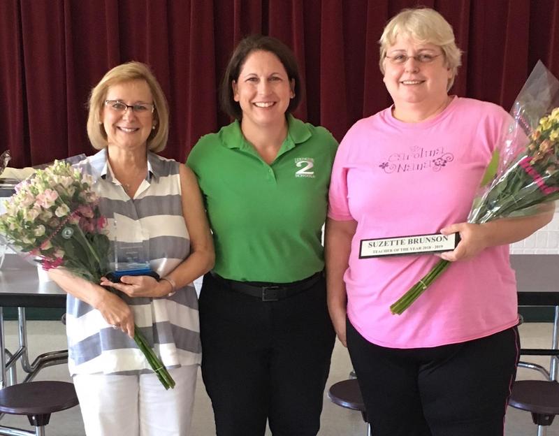 Pair Education Center Support Staff of the Year Donna Stone, left, and Teacher of the Year Suzette Brunson, right, with Principal CR Hall. The district’s schools announced their winners at the end of the school year.