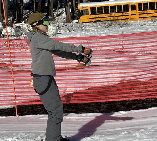 Student learning to snow ski