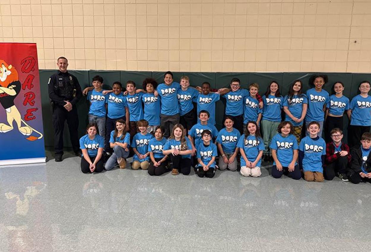 Trafford Elementary 5th-graders celebrate completion of the DARE program in the multipurpose room