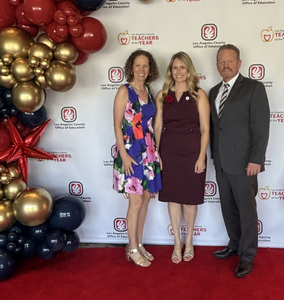 Mrs. Feldman poses with school and Hart District administrators.