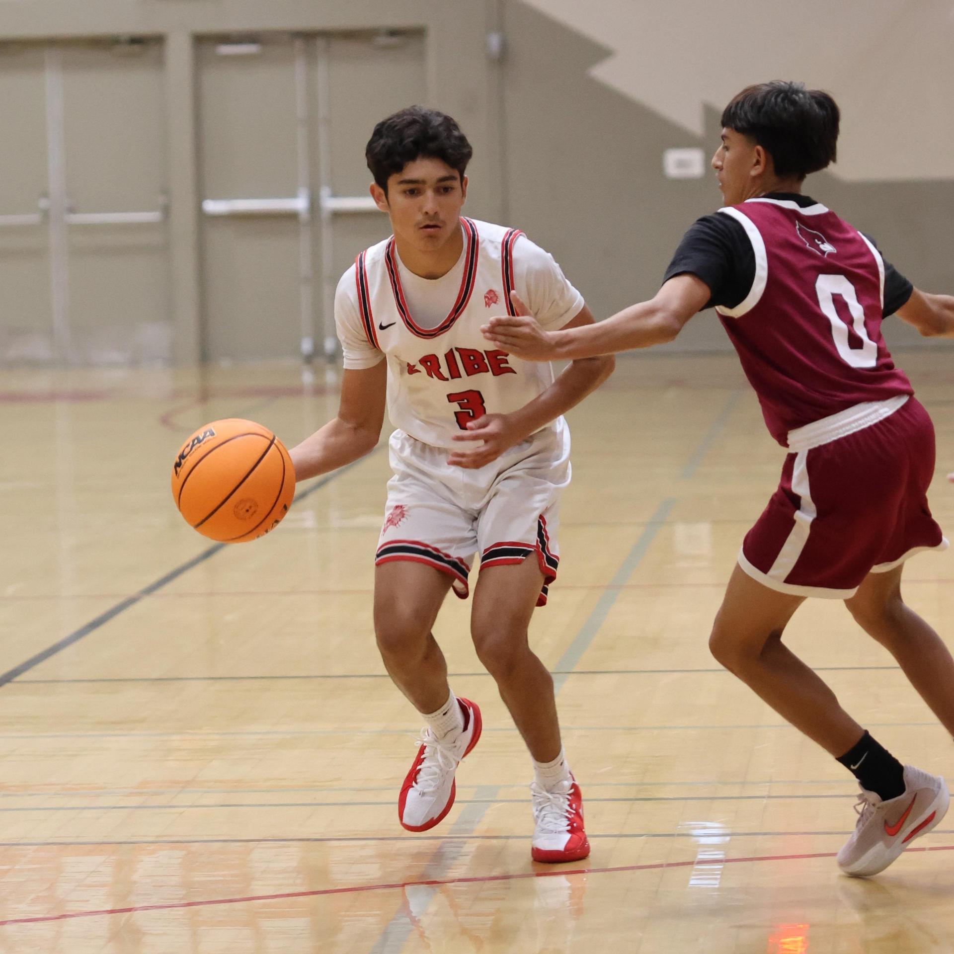 Varsity Boys Basketball playing vs. Orosi 9