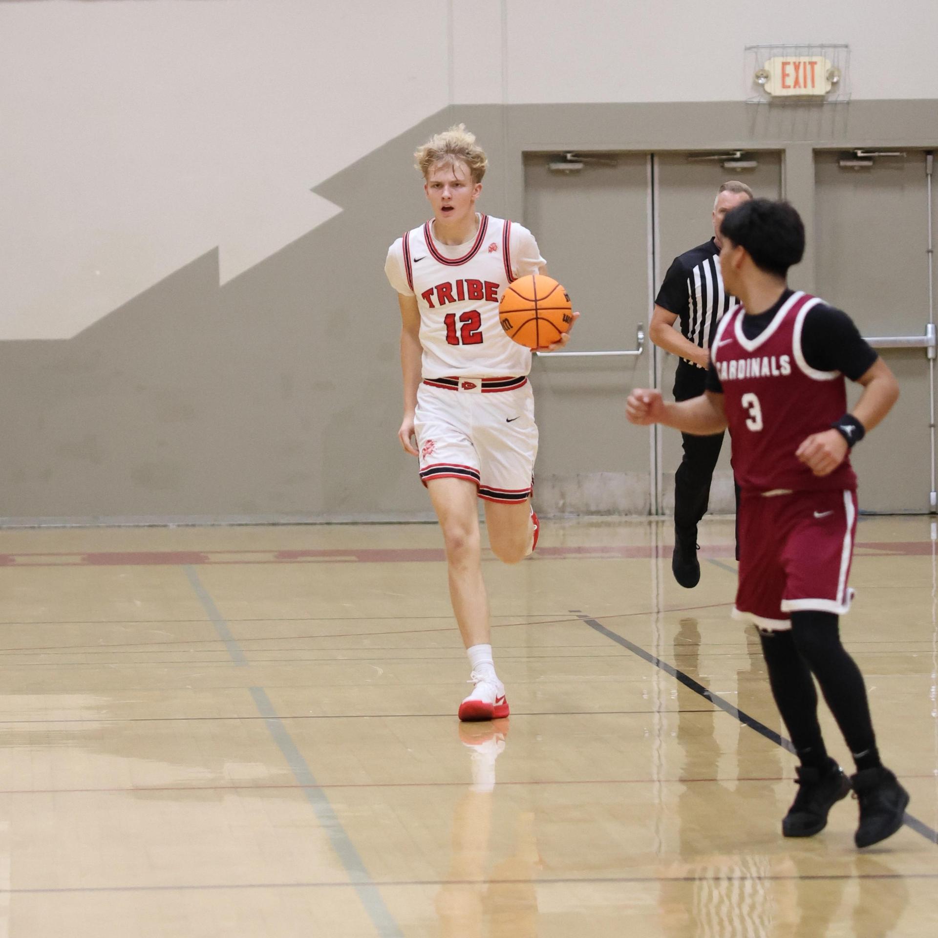 Varsity Boys Basketball playing vs. Orosi 17