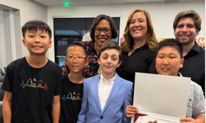 group photo of student winners and teachers