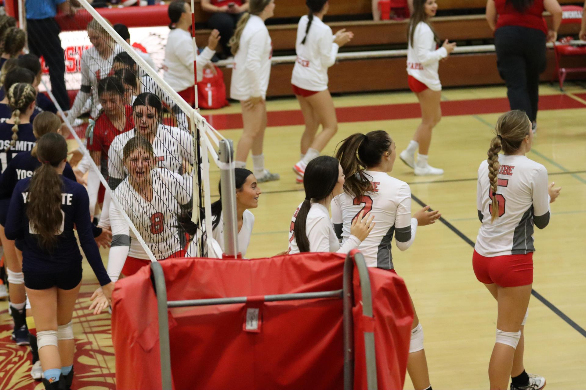 junior varsity girls playing volleyball against Yosemite