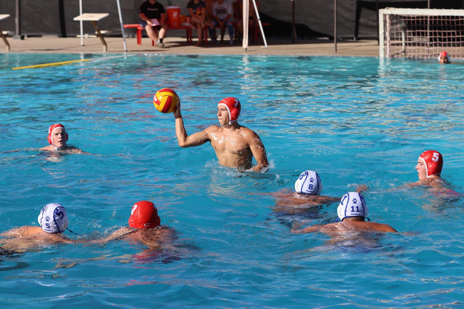 boys playing water polo against Madera