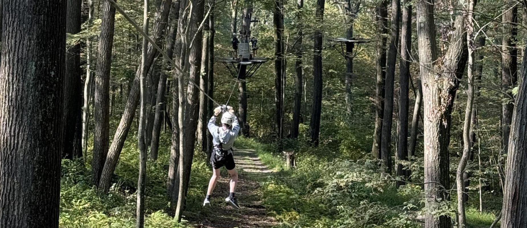 WVU Outdoor Learning Center adventure - student zip lining