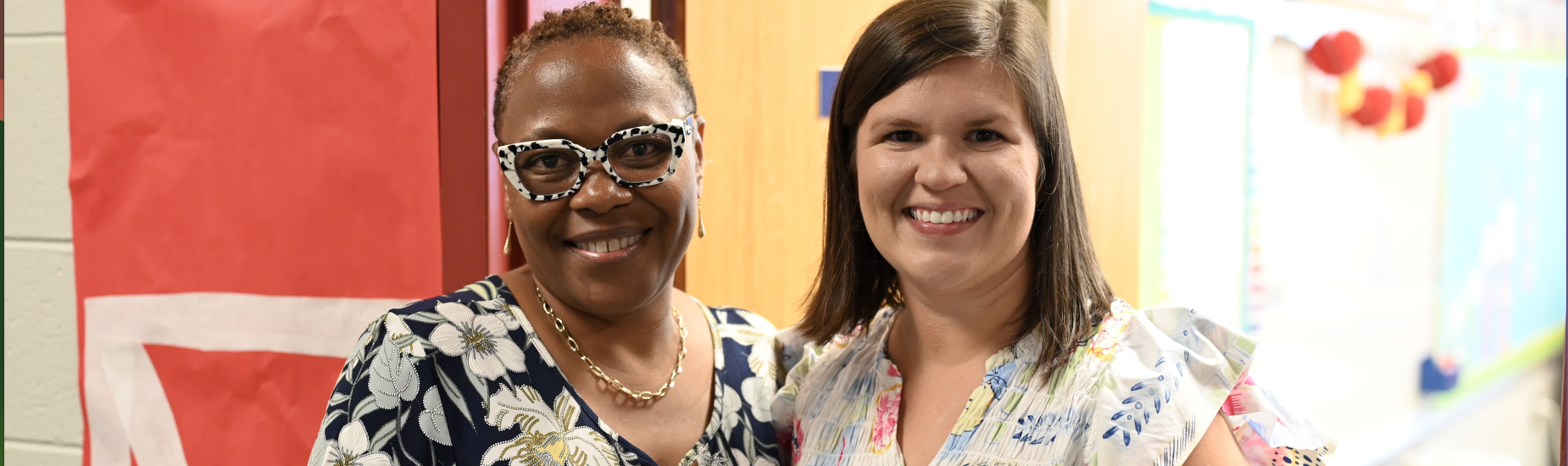 a teacher and her parapro at open house