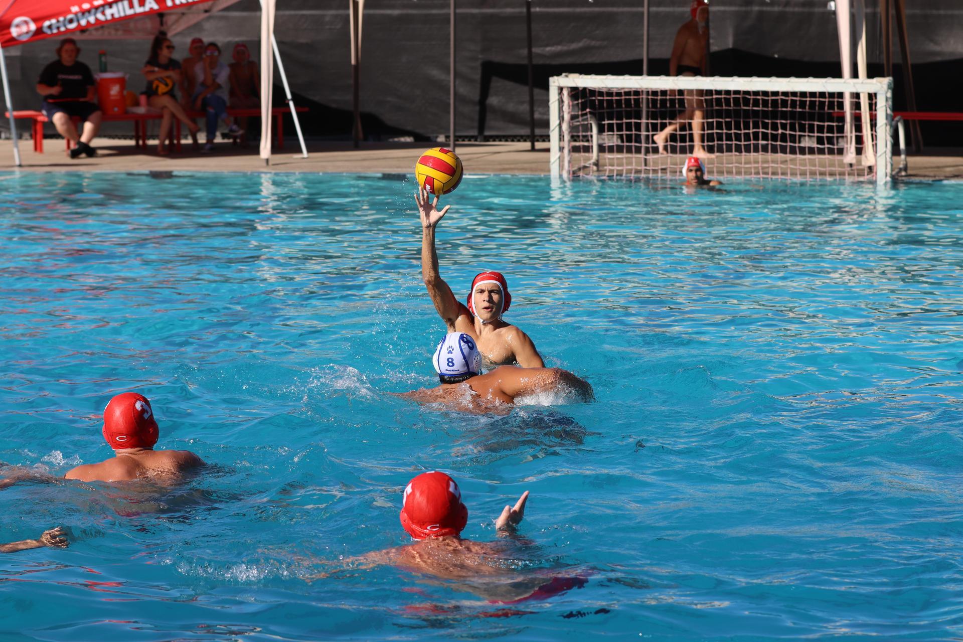 boys playing water polo against Madera