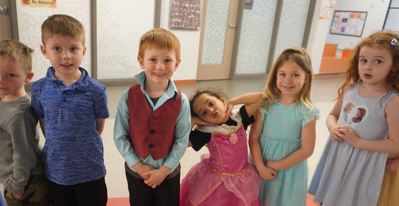 Students dress up as princes and princesses for the literacy ball.