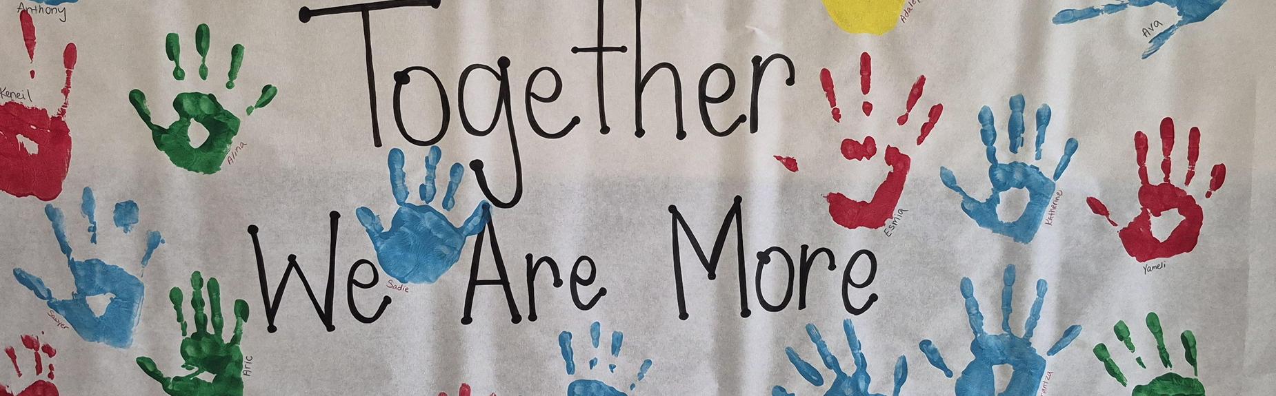 Colorful handprints surround the text 'Together We Are More.'
