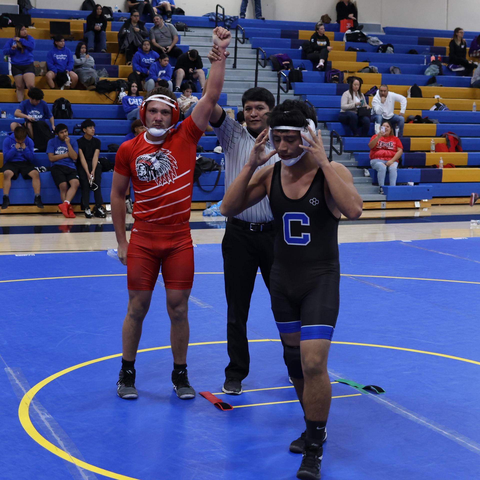 wrestlers in action at parlier